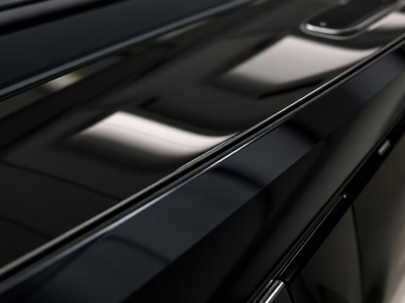 Black car paint with flawless mirror-like finish after 2-step paint correction Scottsdale