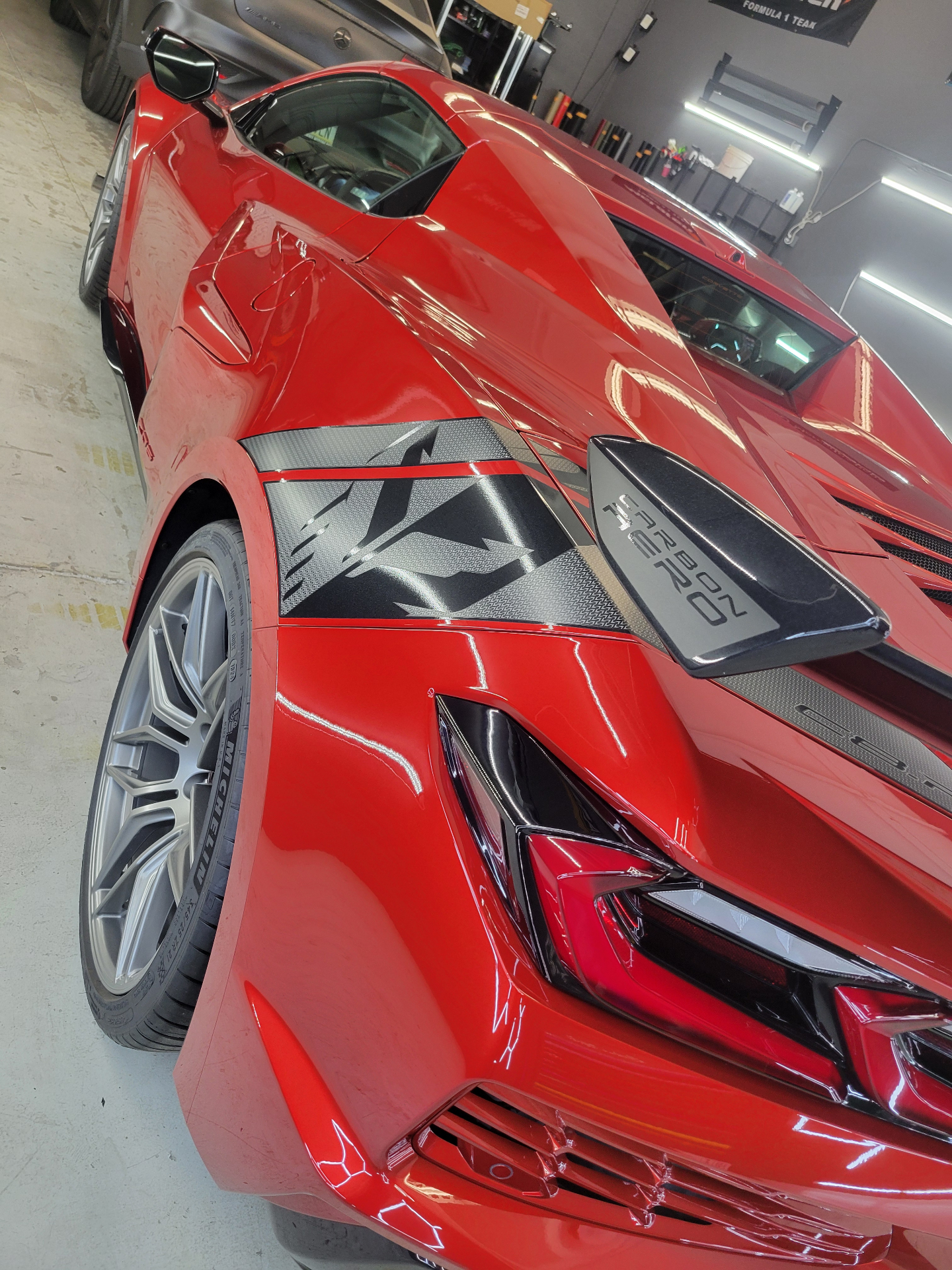 Red Corvette showing enhanced gloss and paint depth from professional ceramic coating Scottsdale AZ